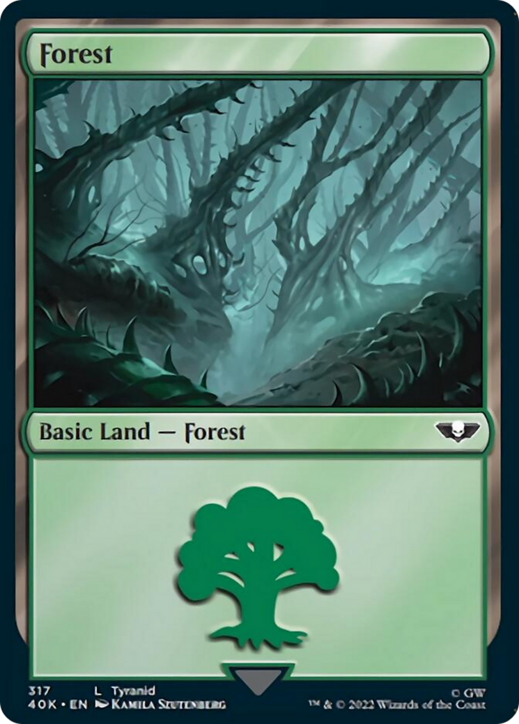 Forest (317) (Surge Foil) [Universes Beyond: Warhammer 40,000] | Jack's On Queen